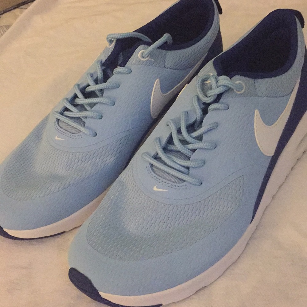 Light blue and white comfortable tennis shoes